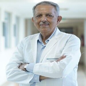 Dr. Arvind Taneja